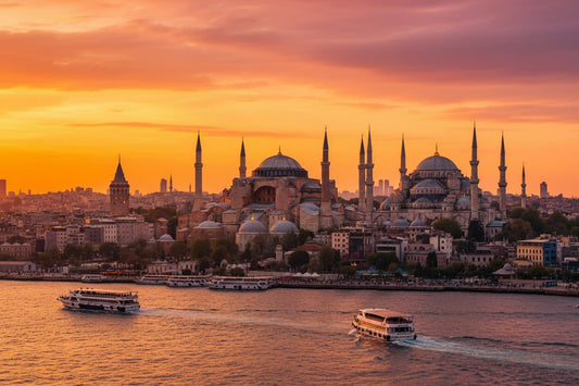 Istanbul Turkey – Hagia Sophia and Blue Mosque domes and minarets at golden sunset, Bosphorus Strait with ferries between Europe and Asia, Galata Tower and historic city skyline reflecting on water