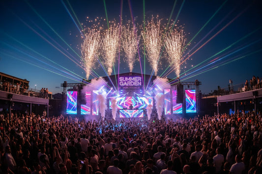 Turkey nightlife – massive open-air club Summer Garden Alanya with thousands of people dancing under laser lights and fireworks, DJ on stage, Mediterranean summer night