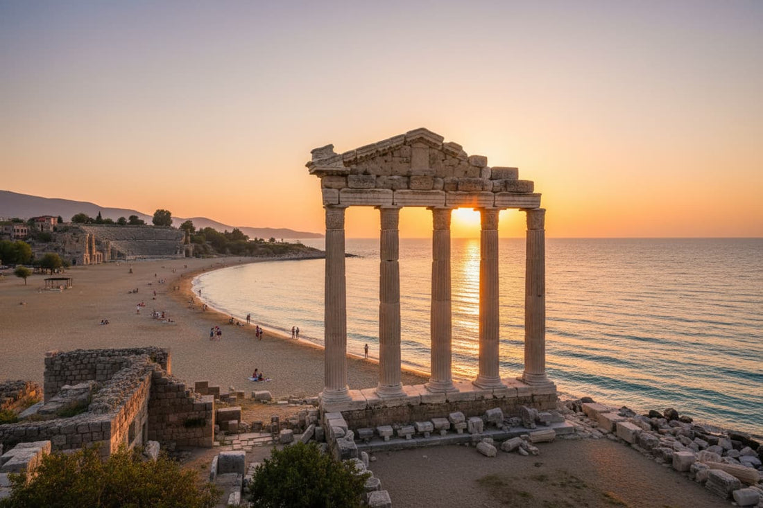 Side Turkey – ancient Roman Temple of Apollo columns at sunset with turquoise Mediterranean sea backdrop, sandy beach flanking the peninsula and ancient theatre ruins in old town